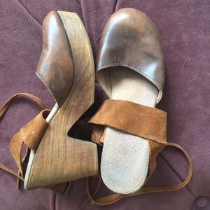 Worn once wooden wrap clogs.